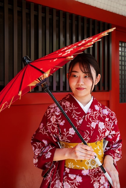 Woman holding wagasa umbrella front view