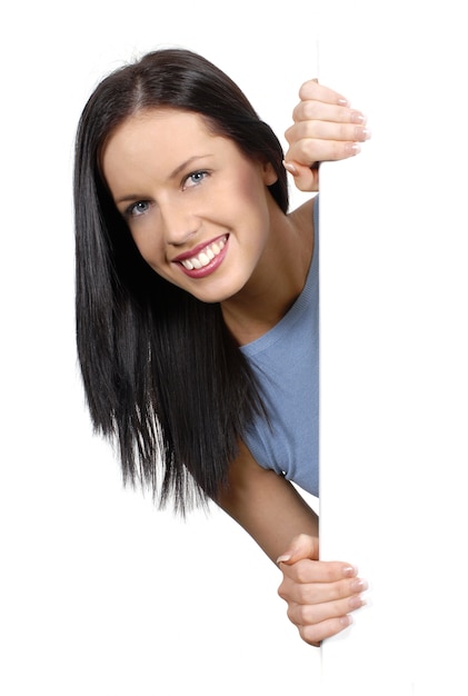 Woman holding a white board 