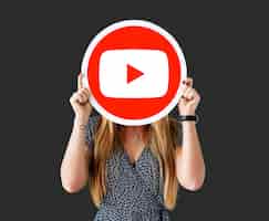 Free photo woman holding a youtube icon