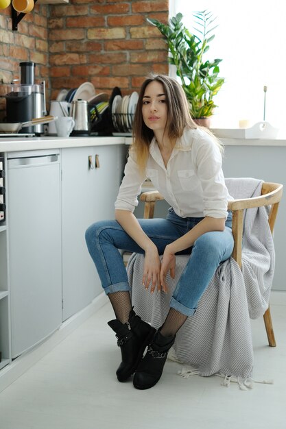 Woman at home in a mug