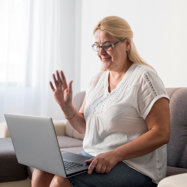 Woman at home in quarantine having a video call