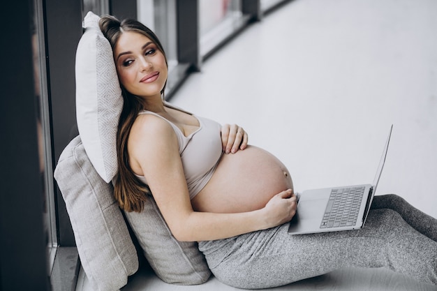 Woman at home using computer