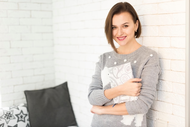 Woman at home with book