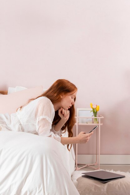 Woman at home working on laptop