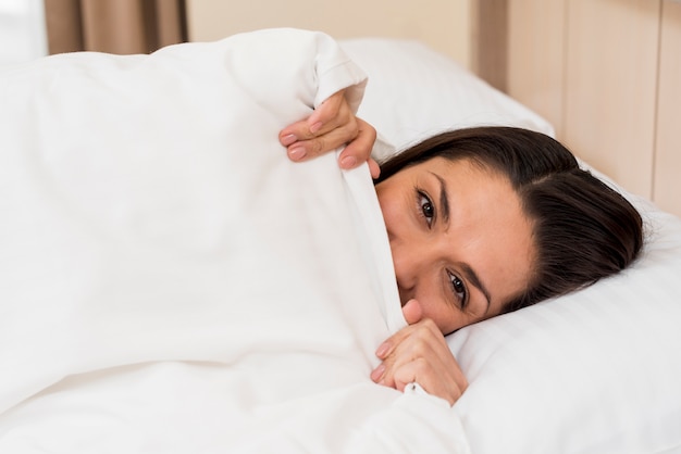 Woman in hotel room