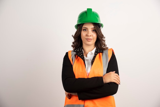 Free photo woman industrial worker posing on white