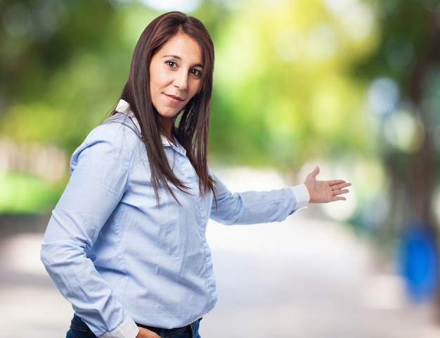 Woman inviting to go by hand