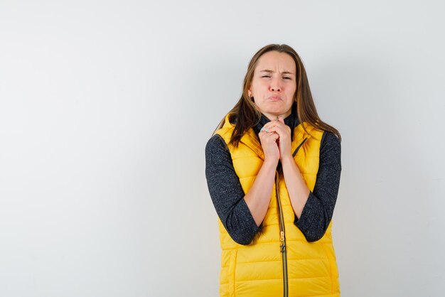 The woman is begging on white background