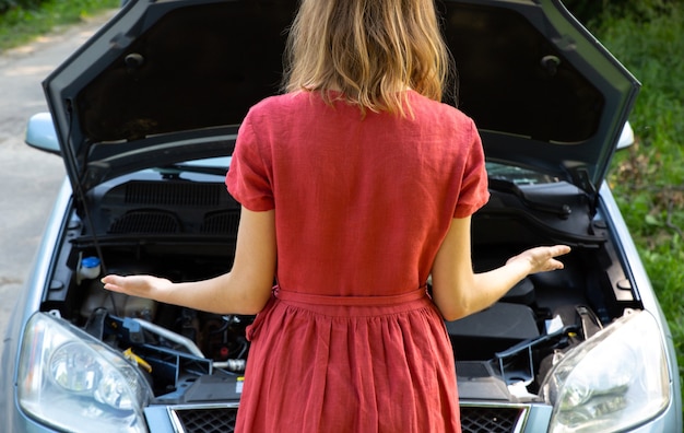 On a car hood, in nature