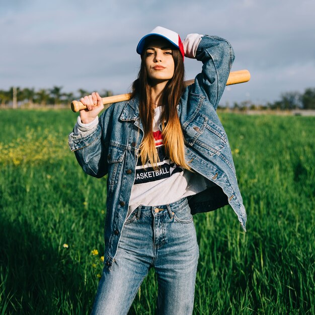 Woman in jeans looking at camera