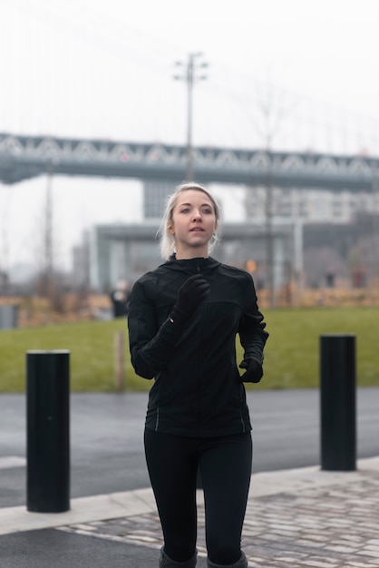 Woman jogging in the winter time