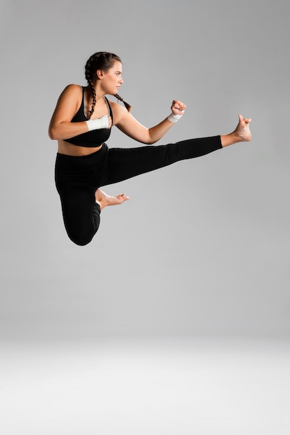 Woman jumping with copy space background