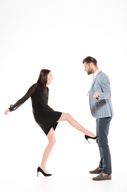 Free photo woman kicking her boyfriend's nuts