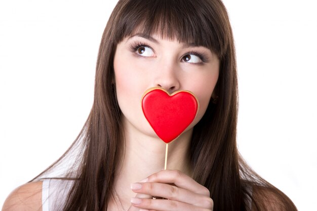 Woman kissing a heart