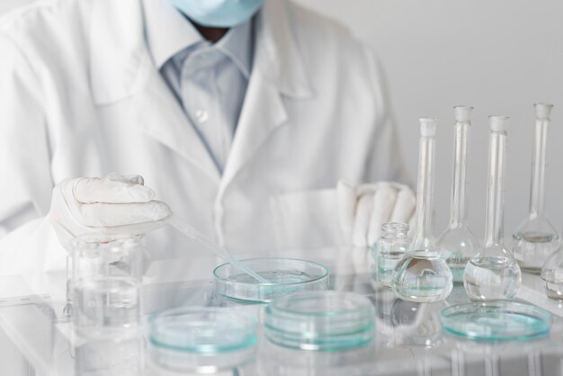 Free Photo woman in laboratory doing experiments close up