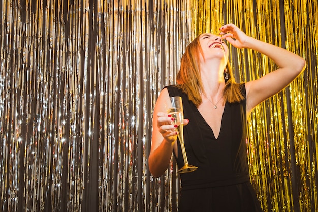 Free photo woman laughing at new year celebrations