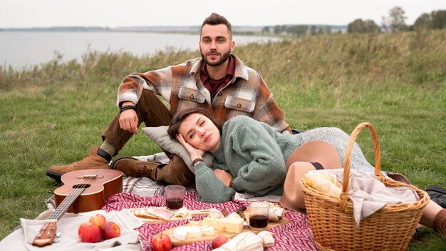 Woman laying on boyfriend's lap