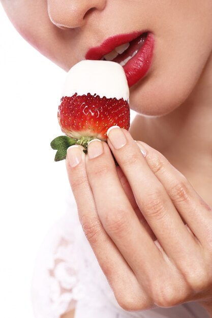 Woman lips and strawberry