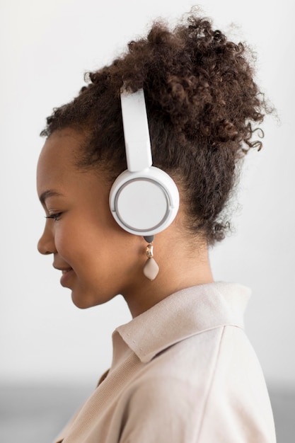 Woman listening to music close up