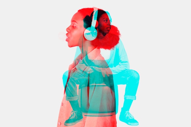 Free photo woman listening to music in double color exposure effect