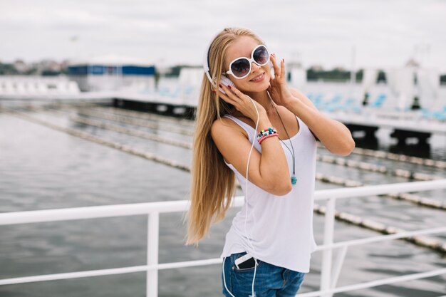 Woman listening to music in headphones