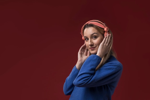 Woman listening to music on headphones