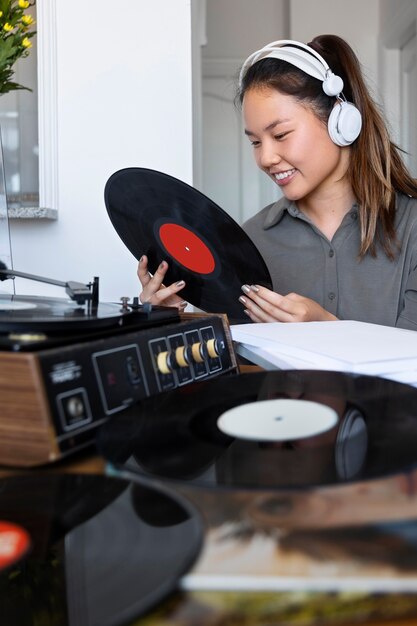 Woman listening to music at home