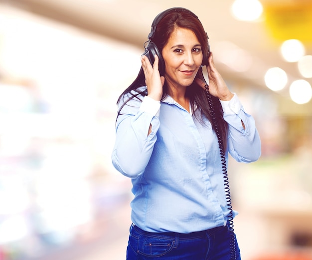 Woman listening to music with a smile