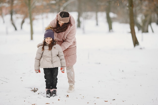 Woman and little girl in a park