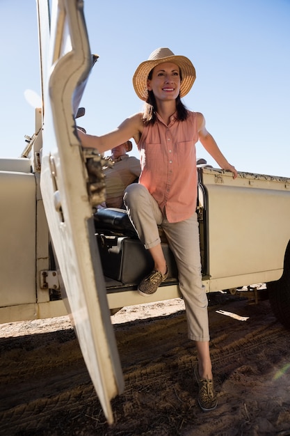 Free photo woman looking away while sitting in vehicle