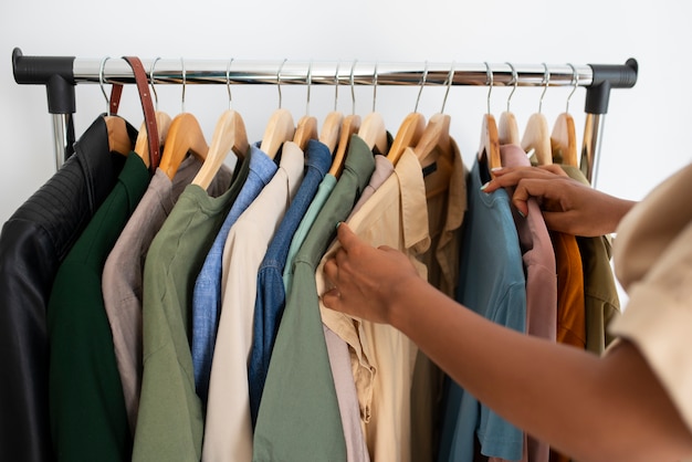 woman looking at clothes side view