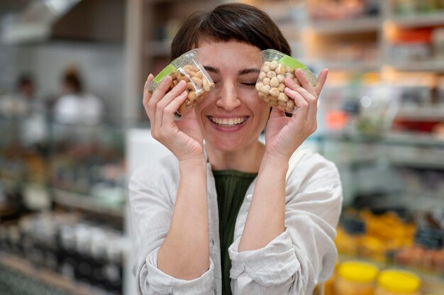 Woman looking for goodies at a local producer