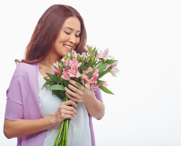 Woman looking at her bouquet