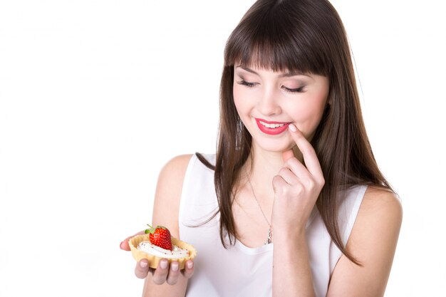 女は、彼女のケーキを探して