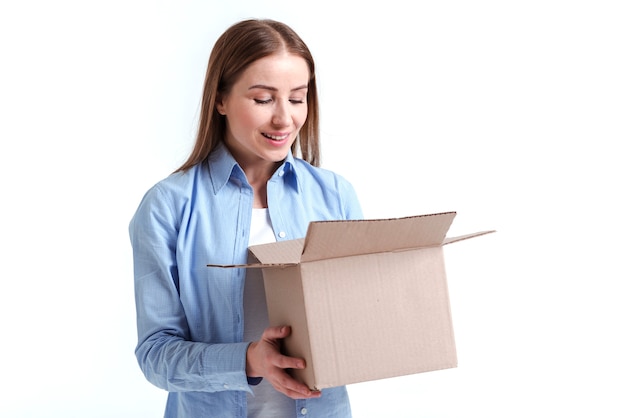 Woman looking into a box medium shot