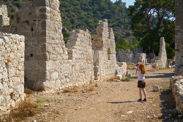 Woman looking at ruins
