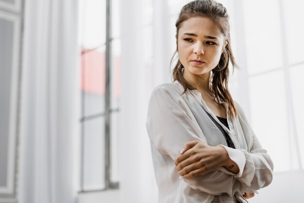 Woman looking sad as she worked from home too much