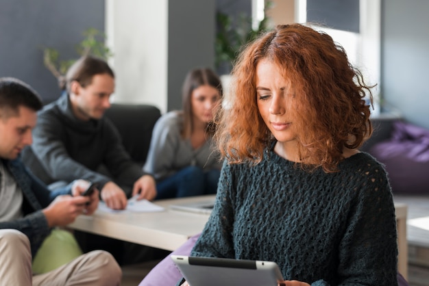 Woman looking at tablet