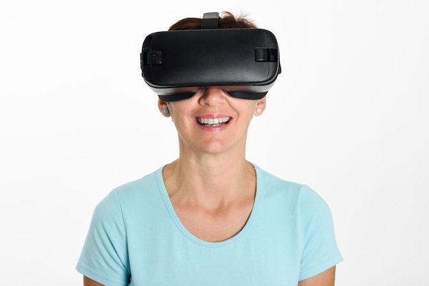 Woman looking in VR glasses and gesturing with his hands.