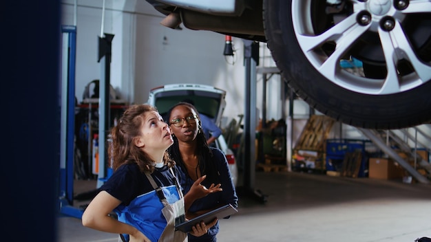 Free photo woman looks online for vehicle parts