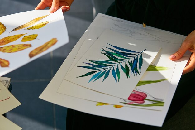 Woman looks through botany images