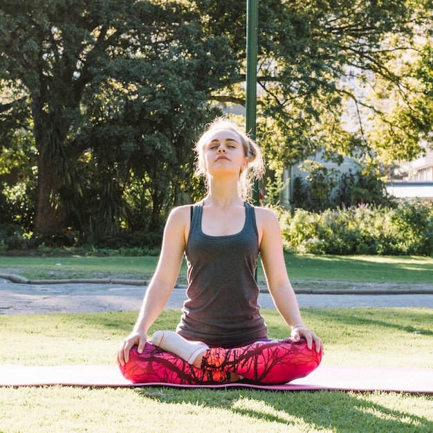 Free photo woman in lotus pose