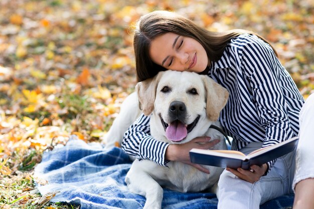 Woman in love with her labrador