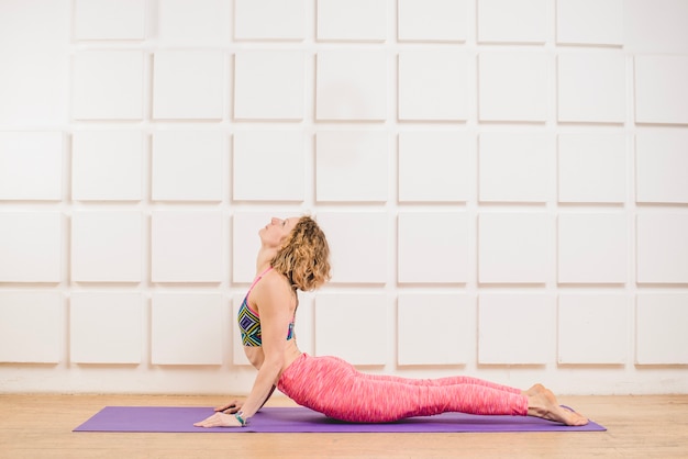 Woman lying and stretching