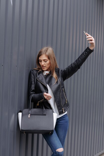 Woman making an auto photo