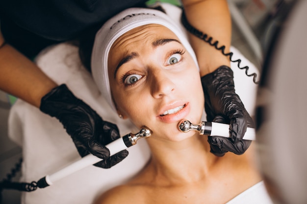 Woman making beauty procedures at a beauty salon