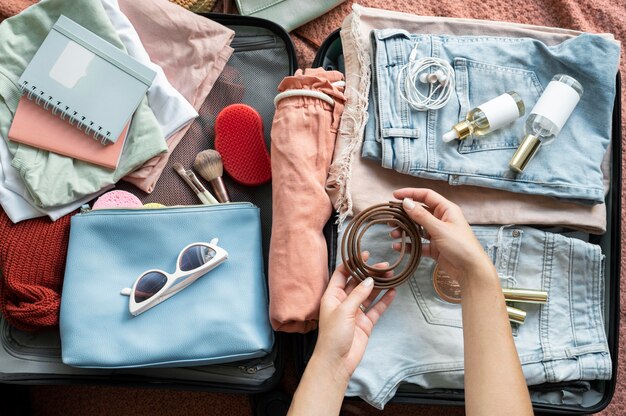 Woman making her baggage for the next vacation