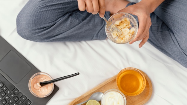 Woman making a natural face mask