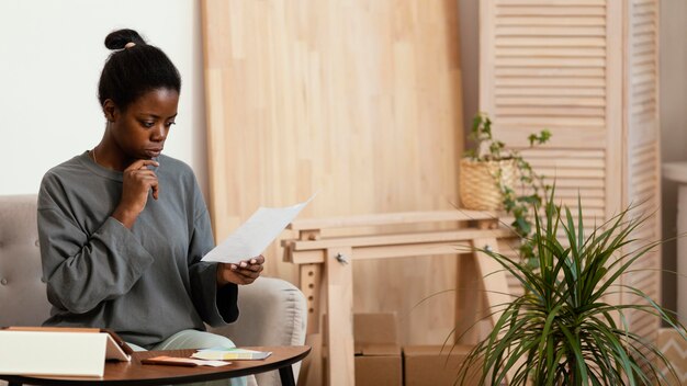 Woman making a plan to redecorate home