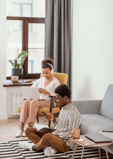 Woman and man remote working from home